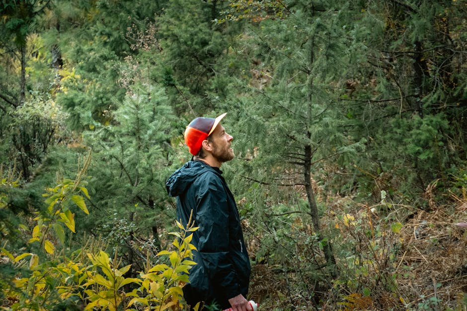 Man in a forest in Karnali Province, Nepal, exemplifying adventure tourism with nature exploration